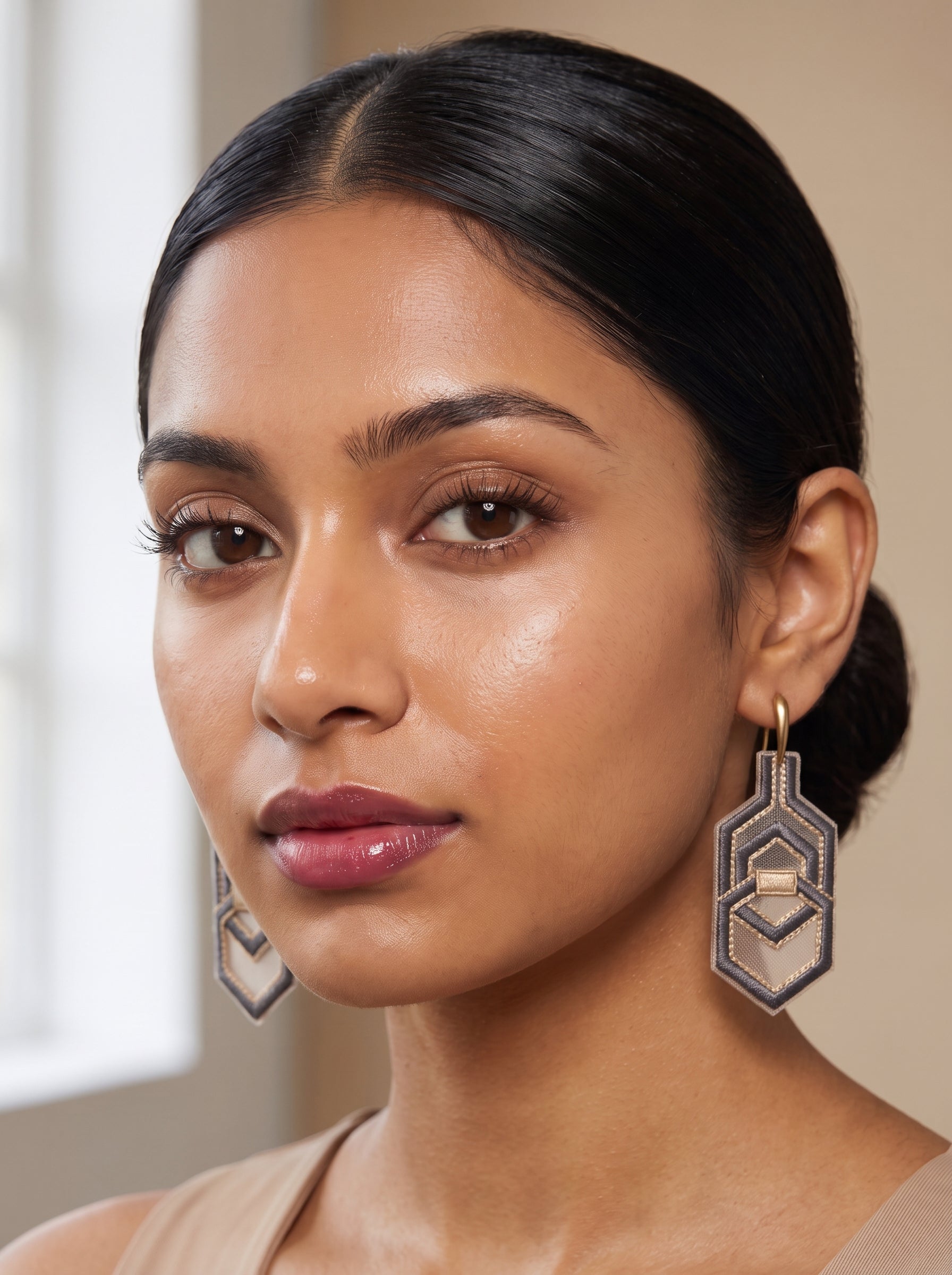 Slate grey hexagonal geometric silver embroidery earrings with gold center accent